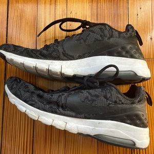 Black cheetah Nike Air Force sneakers